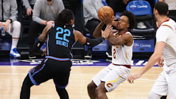 Mar 27, 2021; Sacramento, California, USA; Sacramento Kings forward Richaun Holmes (22) defends Cleveland Cavaliers guard Collin Sexton (2) during the first quarter at Golden 1 Center. Mandatory Credit: Kelley L Cox-USA TODAY Sports