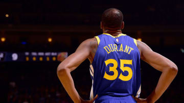 OAKLAND, CA - APRIL 5: Kevin Durant #35 of the Golden State Warriors looks on during the game against the Cleveland Cavaliers on April 5, 2019 at ORACLE Arena in Oakland, California. NOTE TO USER: User expressly acknowledges and agrees that, by downloading and or using this photograph, User is consenting to the terms and conditions of the Getty Images License Agreement. Mandatory Copyright Notice: Copyright 2019 NBAE (Photo by Noah Graham/NBAE via Getty Images)