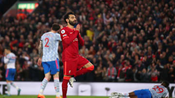 LIVERPOOL, ENGLAND - APRIL 19: Mohamed Salah of Liverpool celebrates scoring his side's fourth goal during the Premier League match between Liverpool and Manchester United at Anfield on April 19, 2022 in Liverpool, England. (Photo by Chris Brunskill/Fantasista/Getty Images)