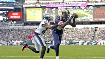 Oct 5, 2014; Philadelphia, PA, USA; St. Louis Rams wide receiver Brian Quick (83) catches 5-yard touchdown pass against Philadelphia Eagles cornerback Cary Williams (26) during the fourth quarter at Lincoln Financial Field. The Eagles defeated the Rams, 34-28. Mandatory Credit: Eric Hartline-USA TODAY Sports