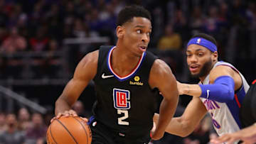 DETROIT, MICHIGAN - FEBRUARY 02: Shai Gilgeous-Alexander #2 of the LA Clippers drives around Bruce Brown #6 of the Detroit Pistons during the first half at Little Caesars Arena on February 02, 2019 in Detroit, Michigan. NOTE TO USER: User expressly acknowledges and agrees that, by downloading and or using this photograph, User is consenting to the terms and conditions of the Getty Images License Agreement. (Photo by Gregory Shamus/Getty Images)