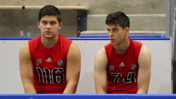 BUFFALO, NY - JUNE 2: Alexander Khovanov (left) and Grigori Denisenko (right) wait for their turns during the NHL Scouting Combine on June 2, 2018 at HarborCenter in Buffalo, New York. (Photo by Bill Wippert/NHLI via Getty Images)