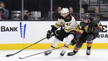 LAS VEGAS, NEVADA - OCTOBER 08: David Backes #42 of the Boston Bruins skates with the puck against Nicolas Hague #14 of the Vegas Golden Knights in the first period of their game at T-Mobile Arena on October 8, 2019 in Las Vegas, Nevada. The Bruins defeated the Golden Knights 4-3. (Photo by Ethan Miller/Getty Images)