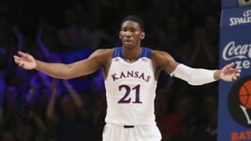 Nov 28, 2013; Paradise Island, BAHAMAS; Kansas Jayhawks center Joel Embiid (21) reacts during the game against the Wake Forest Demon Deacons at the 2013 Battle 4 Atlantis in the Imperial Arena at the Atlantis Resort. Mandatory Credit: Kevin Jairaj-USA TODAY Sports