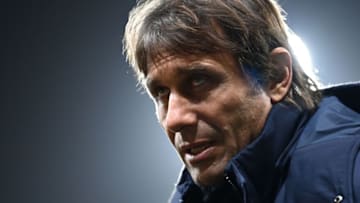 Tottenham Hotspur's Italian head coach Antonio Conte reacts at a press interview after the English Premier League football match between Watford and Tottenham Hotspur at Vicarage Road Stadium in Watford, southeast England, on January 1, 2022. - RESTRICTED TO EDITORIAL USE. No use with unauthorized audio, video, data, fixture lists, club/league logos or 'live' services. Online in-match use limited to 120 images. An additional 40 images may be used in extra time. No video emulation. Social media in-match use limited to 120 images. An additional 40 images may be used in extra time. No use in betting publications, games or single club/league/player publications. (Photo by Glyn KIRK / AFP) / RESTRICTED TO EDITORIAL USE. No use with unauthorized audio, video, data, fixture lists, club/league logos or 'live' services. Online in-match use limited to 120 images. An additional 40 images may be used in extra time. No video emulation. Social media in-match use limited to 120 images. An additional 40 images may be used in extra time. No use in betting publications, games or single club/league/player publications. / RESTRICTED TO EDITORIAL USE. No use with unauthorized audio, video, data, fixture lists, club/league logos or 'live' services. Online in-match use limited to 120 images. An additional 40 images may be used in extra time. No video emulation. Social media in-match use limited to 120 images. An additional 40 images may be used in extra time. No use in betting publications, games or single club/league/player publications. (Photo by GLYN KIRK/AFP via Getty Images)