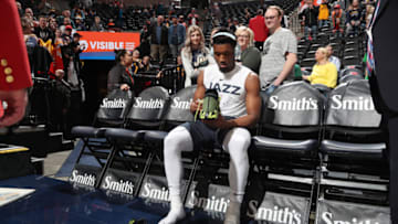 SALT LAKE CITY, UT - MARCH 4: Donovan Mitchell #45 of the Utah Jazz autographs his sneakers for fans prior to a game against the New Orleans Pelicans on March 4, 2019 at vivint.SmartHome Arena in Salt Lake City, Utah. NOTE TO USER: User expressly acknowledges and agrees that, by downloading and or using this Photograph, User is consenting to the terms and conditions of the Getty Images License Agreement. Mandatory Copyright Notice: Copyright 2019 NBAE (Photo by Melissa Majchrzak/NBAE via Getty Images)
