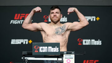 LAS VEGAS, NEVADA - FEBRUARY 18: In this UFC handout, Jim Miller poses on the scale during the UFC Fight Night weigh-in at UFC APEX on February 18, 2022 in Las Vegas, Nevada. (Photo by Jeff Bottari/Zuffa LLC/Getty Images)