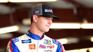 JOLIET, ILLINOIS - JUNE 27: Todd Gilliland, driver of the #4 Mobil 1 Toyota, stands in the garage area during practice for the NASCAR Gander Outdoors Truck Series Camping World 225 at Chicagoland Speedway on June 27, 2019 in Joliet, Illinois. (Photo by Jared C. Tilton/Getty Images)