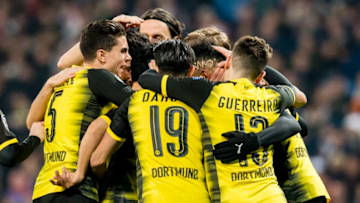 MADRID, SPAIN - DECEMBER 06: Pierre-Emerick Aubameyang of Borussia Dortmund celebrates after scoring the goal to the 2:2 with his team mates during the UEFA Champions League match between Real Madrid and Borussia Dortmund at Estadio Santiago Bernabeu on December 06, 2017 in Madrid, Spain. (Photo by Alexandre Simoes/Borussia Dortmund/Getty Images)