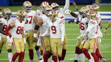 INGLEWOOD, CALIFORNIA - NOVEMBER 29: Robbie Gould #9 of the San Francisco 49ers celebrates with teammates after making a game-winning field goal during the fourth quarter to defeat the Los Angeles Rams 23-20 at SoFi Stadium on November 29, 2020 in Inglewood, California. (Photo by Harry How/Getty Images)