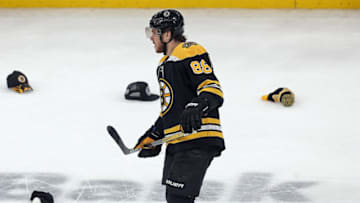 BOSTON, MA. - FEBRUARY 12: Hats go flying after David Pastrnak #88 of the Boston Bruins 3rd goal for a hat trick during the second period of the NHL game against the Montreal Canadiens at the TD Garden on February 12, 2020 in Boston, Massachusetts. (Staff Photo By Matt Stone/MediaNews Group/Boston Herald)