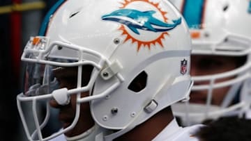 Oct 27, 2013; Foxborough, MA, USA; The Miami Dolphins logo is seen on their helmet before their game against the New England Patriots at Gillette Stadium. Mandatory Credit: Winslow Townson-USA TODAY Sports