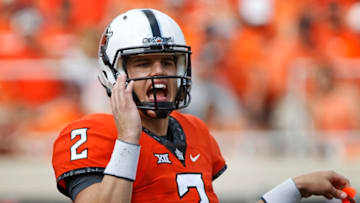 STILLWATER, OK - SEPTEMBER 17 : Quarterback Mason Rudolph #2 of the Oklahoma State Cowboys calls a play during the game against the Pittsburgh Panthers September 17, 2016 at Boone Pickens Stadium in Stillwater, Oklahoma. Oklahoma State defeated Pitt 45-38. (Photo by Brett Deering/Getty Images)