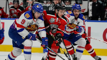 QUEBEC CITY, QC - NOVEMBER 20: Aleksei Sergeev #76 of the Quebec Remparts skates with the puck against the Moncton Wildcats during their QMJHL hockey game at the Videotron Center on November 20, 2018 in Quebec City, Quebec, Canada. (Photo by Mathieu Belanger/Getty Images)