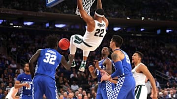 Nov 15, 2016; New York, NY, USA; Michigan State Spartans forward Miles Bridges (22) dunks against Kentucky Wildcats forward Wenyen Gabriel (32) and forward Bam Adebayo (3) during the first half at Madison Square Garden. Mandatory Credit: Brad Penner-USA TODAY Sports