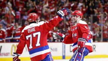 Mar 1, 2016; Washington, DC, USA; Washington Capitals defenseman Matt Niskanen (2) celebrates with Capitals right wing T.J. Oshie (77) after scoringa goal against the Pittsburgh Penguins in the third period at Verizon Center. The Capitals won 3-2. Mandatory Credit: Geoff Burke-USA TODAY Sports
