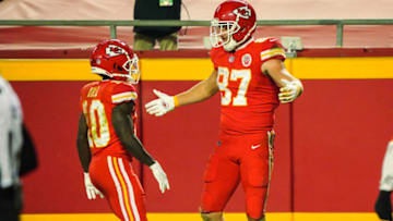 Dec 6, 2020; Kansas City, Missouri, USA; Kansas City Chiefs tight end Travis Kelce (87) celebrates with wide receiver Tyreek Hill (10) after scoring a touchdown against the Denver Broncos during the second half at Arrowhead Stadium. Mandatory Credit: Jay Biggerstaff-USA TODAY Sports