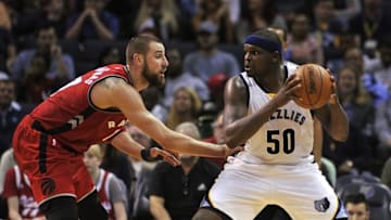 Apr 1, 2016; Memphis, TN, USA; Memphis Grizzlies forward Zach Randolph (50) handles the ball against Toronto Raptors center Jonas Valanciunas (17) during the second half at FedExForum. Toronto beat Memphis 99-95. Mandatory Credit: Justin Ford-USA TODAY Sports