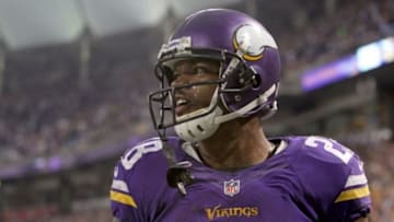 Dec 1, 2013; Minneapolis, MN, USA; Minnesota Vikings running back Adrian Peterson (28) looks on during overtime against the Chicago Bears at Mall of America Field at H.H.H. Metrodome. The Vikings defeated the Bears 23-20 in overtime. Mandatory Credit: Brace Hemmelgarn-USA TODAY Sports