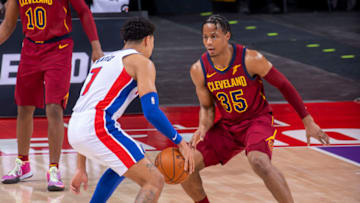 DETROIT, MI - DECEMBER 26: Isaac Okoro #35 of the Cleveland Cavaliers defends against Killian Hayes #7 of the Detroit Pistons in the first half of the home opener during an NBA game at Little Caesars Arena on December 26, 2020 in Detroit, Michigan. NOTE TO USER: User expressly acknowledges and agrees that, by downloading and or using this photograph, User is consenting to the terms and conditions of the Getty Images License Agreement. (Photo by Dave Reginek/Getty Images)