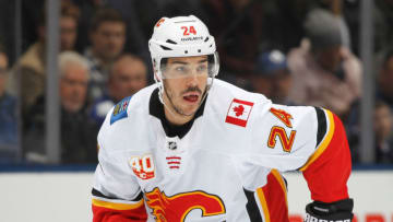 TORONTO, ON - JANUARY 16: Travis Hamonic #24 of the Calgary Flames skates against the Toronto Maple Leafs during an NHL game at Scotiabank Arena on January 16, 2020 in Toronto, Ontario, Canada. The Flames defeated the Maple Leafsd 2-1 in a shoot-out. (Photo by Claus Andersen/Getty Images)