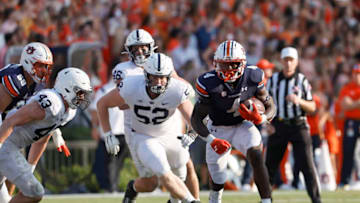 Auburn footballSep 17, 2022; Auburn, Alabama, USA; Auburn Tigers running back Tank Bigsby (4) carries against the Penn State Nittany Lions during the third quarter at Jordan-Hare Stadium. Mandatory Credit: John Reed-USA TODAY Sports