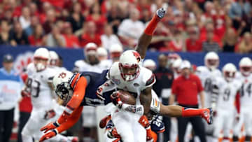 Sep 5, 2015; Atlanta, GA, USA; Louisville Cardinals wide receiver Jaylen Smith (87) catches a pass defended by Auburn Tigers linebacker Kris Frost (17) and Blake Countess (24) during the first quarter in the 2015 Chick-fil-A Kickoff Game at the Georgia Dome. Mandatory Credit: Jason Getz-USA TODAY Sports