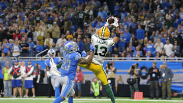 DETROIT, MI - DECEMBER 29: Allen Lazard #13 of the Green Bay Packers catches a fourth quarter touchdown pass in front of Darius Slay #23 of the Detroit Lions at Ford Field on December 29, 2019 in Detroit, Michigan. (Photo by Rey Del Rio/Getty Images)