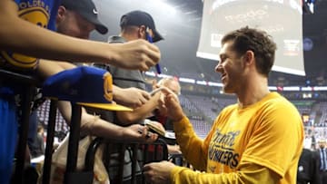 May 7, 2016; Portland, OR, USA; Golden State Warriors assistant coach Luke Walton signs autographs for fans before game three of the second round of the NBA Playoffs Portland Trail Blazers at Moda Center at the Rose Quarter. Mandatory Credit: Jaime Valdez-USA TODAY Sports