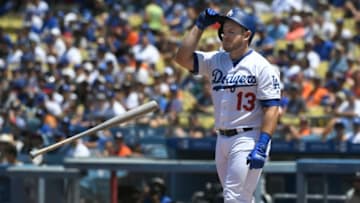 LOS ANGELES, CA - AUGUST 05: Max Muncy #13 of the Los Angeles Dodgers reacts to striking out to end the thrid inning against the Houston Astros at Dodger Stadium on August 5, 2018 in Los Angeles, California. (Photo by John McCoy/Getty Images)