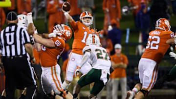 Oct 10, 2020; Clemson, South Carolina, USA; Clemson Tigers quarterback Trevor Lawrence (16) throws the ball against the Miami Hurricanes during the second quarter at Memorial Stadium. Mandatory Credit: Ken Ruinard-USA TODAY Sports
