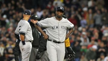 Apr 23, 2014; Boston, MA, USA; New York Yankees starting pitcher Michael Pineda (35) reacts after being ejected for using a foreign substance during the second inning against the Boston Red Sox at Fenway Park. Mandatory Credit: Bob DeChiara-USA TODAY Sports