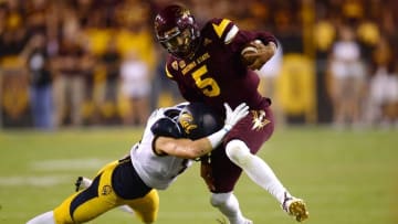 Sep 24, 2016; Tempe, AZ, USA; California Golden Bears safety Luke Rubenzer (17) tackles Arizona State Sun Devils quarterback Manny Wilkins (5) during the first half at Sun Devil Stadium. Mandatory Credit: Joe Camporeale-USA TODAY Sports