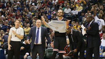 Mar 6, 2015; Indianapolis, IN, USA; Chicago Bulls center Joakim Noah (13) and coach Tom Thibodeau react after a call during the game against the Indiana Pacers at Bankers Life Fieldhouse. Indiana defeats Chicago 98-84. Mandatory Credit: Brian Spurlock-USA TODAY Sports