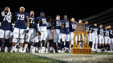 STATE COLLEGE, PA - OCTOBER 22: Penn State Nittany Lions sing the Alma Mater after winning the Governors Victory Bell trophy against the Minnesota Golden Gophers at Beaver Stadium on October 22, 2022 in State College, Pennsylvania. (Photo by Scott Taetsch/Getty Images)
