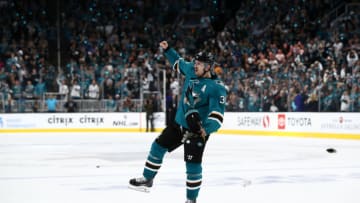 SAN JOSE, CALIFORNIA - APRIL 23: Logan Couture #39 of the San Jose Sharks celebrates after the Sharks beat the Vegas Golden Knights in overtime of Game Seven of the Western Conference First Round during the 2019 NHL Stanley Cup Playoffs at SAP Center on April 23, 2019 in San Jose, California. (Photo by Ezra Shaw/Getty Images)
