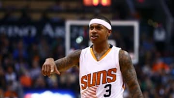 Dec 23, 2014; Phoenix, AZ, USA; Phoenix Suns guard Isaiah Thomas (3) reacts against the Dallas Mavericks at US Airways Center. The Suns defeated the Mavericks 124-115. Mandatory Credit: Mark J. Rebilas-USA TODAY Sports