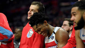 LOS ANGELES, CA - JANUARY 30: De'Aaron Fox #5 of the Sacramento Kings smiles on the bench after scoring a game high 34 points against the Los Angeles Clippers during the first half at Staples Center on January 30, 2020 in Los Angeles, California. NOTE TO USER: User expressly acknowledges and agrees that, by downloading and/or using this Photograph, user is consenting to the terms and conditions of the Getty Images License Agreement. (Photo by Kevork Djansezian/Getty Images)