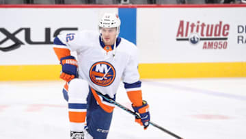 DENVER, CO - DECEMBER 31: Scott Mayfield #42 of the New York Islanders stretches prior to the game against the Colorado Avalanche at the Pepsi Center on December 31, 2017 in Denver, Colorado. (Photo by Michael Martin/NHLI via Getty Images)