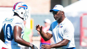 Jul 31, 2015; Pittsford, NY, USA; Buffalo Bills running backs coach Anthony Lynn instructs Karlos Williams (40) during training camp at St. John Fisher College. Mandatory Credit: Mark Konezny-USA TODAY Sports
