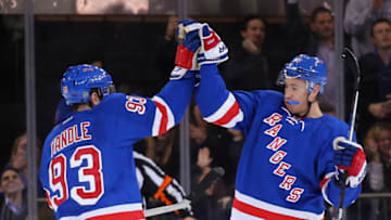 NEW YORK, NY - NOVEMBER 23: Keith Yandle #93 and Kevin Hayes #13 of the New York Rangers celebrate Hayes' third period goal against the Nashville Predators at Madison Square Garden on November 23, 2015 in New York City. The Rangers shutout the Predators 3-0. (Photo by Bruce Bennett/Getty Images)
