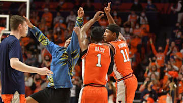 Nov 29, 2021; Champaign, Illinois, USA; Illinois Fighting Illini players celebrate their half time lead over the Notre Dame fighting Illini during the first half at State Farm Center. Mandatory Credit: Ron Johnson-USA TODAY Sports
