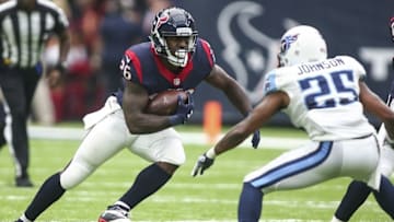 Oct 2, 2016; Houston, TX, USA; Houston Texans running back Lamar Miller (26) runs with the ball during the second quarter as Tennessee Titans free safety Rashad Johnson (25) defends at NRG Stadium. Mandatory Credit: Troy Taormina-USA TODAY Sports