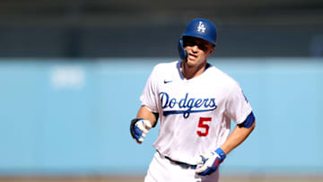 LOS ANGELES, CALIFORNIA - OCTOBER 19: Corey Seager #5 of the Los Angeles Dodgers rounds the bases as he hits a 2-run home run during the 1st inning of Game 3 of the National League Championship Series against the Atlanta Braves at Dodger Stadium on October 19, 2021 in Los Angeles, California. (Photo by Sean M. Haffey/Getty Images)
