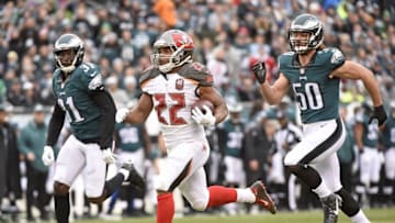 Nov 22, 2015; Philadelphia, PA, USA; Tampa Bay Buccaneers running back Doug Martin (22) runs against Philadelphia Eagles cornerback Byron Maxwell (31) and linebacker Kiko Alonso (50) during the first quarter at Lincoln Financial Field. Mandatory Credit: Eric Hartline-USA TODAY Sports