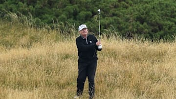 TURNBERRY, SCOTLAND - JULY 15: U.S. President Donald Trump plays a round of golf at Trump Turnberry Luxury Collection Resort during the U.S. President's first official visit to the United Kingdom on July 15, 2018 in Turnberry, Scotland. The President of the United States and First Lady, Melania Trump on their first official visit to the UK after yesterday's meetings with the Prime Minister and the Queen is in Scotland for private weekend stay at his Turnberry. (Photo by Leon Neal/Getty Images)