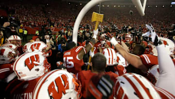 MADISON, WI - NOVEMBER 29: The Wisconsin Badgers celebrate with the Paul Bunyan axe after the 34-24 win over the Minnesota Golden Gophers at Camp Randall Stadium on November 29, 2014 in Madison, Wisconsin. (Photo by Mike McGinnis/Getty Images)