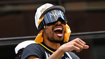 Otto Porter Jr. celebrates from a double decker bus during the Golden State Warriors NBA Championship victory parade along Market Street on June 20, 2022 in San Francisco, California. - Tens of thousands of fans poured onto the streets of San Francisco on Monday to salute the victorious Golden State Warriors as the team celebrated its fourth NBA championship in eight seasons with an open-top bus parade. (Photo by Patrick T. FALLON / AFP) (Photo by PATRICK T. FALLON/AFP via Getty Images)