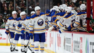 Dec 16, 2021; Saint Paul, Minnesota, USA; Buffalo Sabres center Dylan Cozens (24) celebrates with teammates after scoring a goal against the Minnesota Wild in the second period at Xcel Energy Center. Mandatory Credit: David Berding-USA TODAY Sports