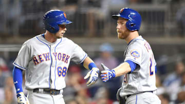 WASHINGTON, DC - SEPTEMBER 20: Jeff McNeil #68 of the New York Mets celebrates scoring a run with Todd Frazier #21 during a baseball game against the Washington Nationals at Nationals Park on September 20, 2018 in Washington, DC. (Photo by Mitchell Layton/Getty Images)